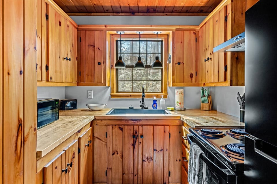 Cook, bake, and create in our well-equipped cabin kitchen