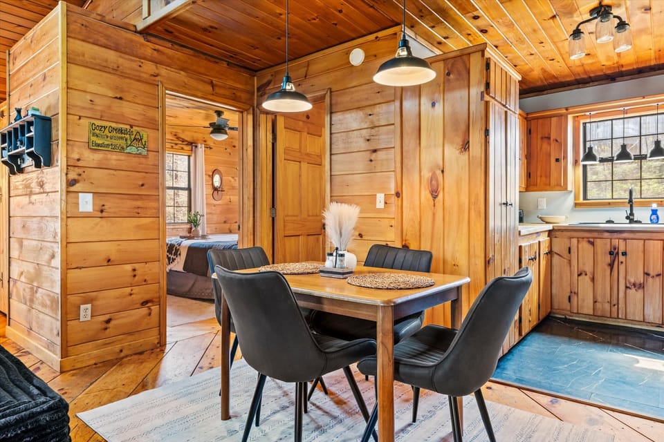 A 4-seater spot perfect for meals, steps from kitchen and bedroom