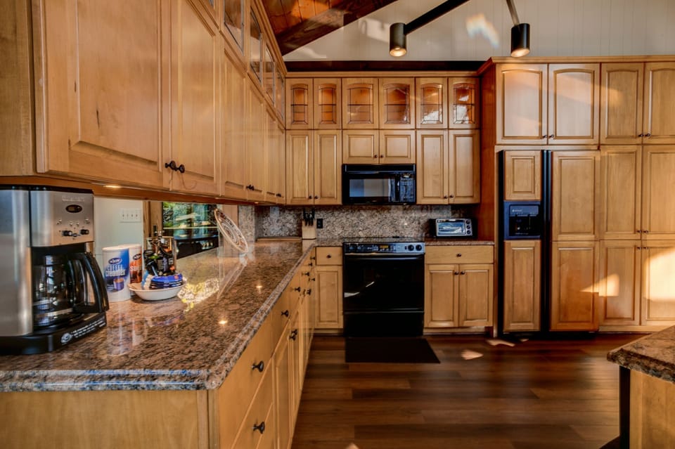 Kitchen is outfitted with an electric range