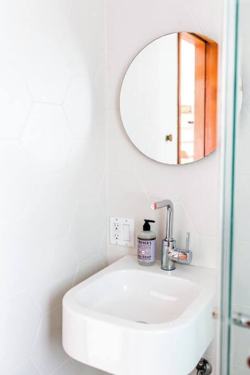 Second bathroom right outside second bedroom