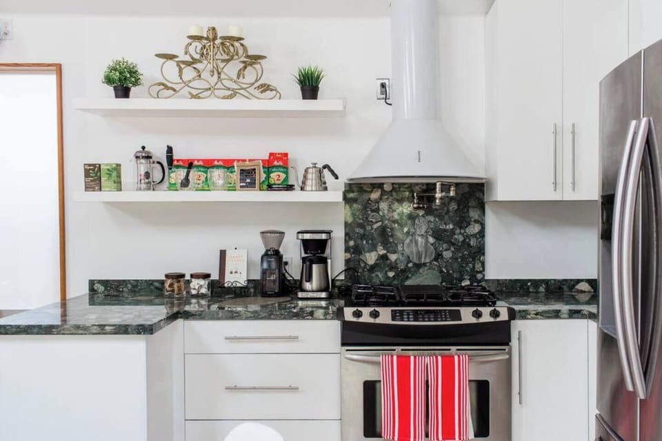 The other side of the kitchen is equipped with a full coffee bar! If you're new (or a veteran) to craft coffee, we have everything you need to make coffee using a French press or pourover dripper.