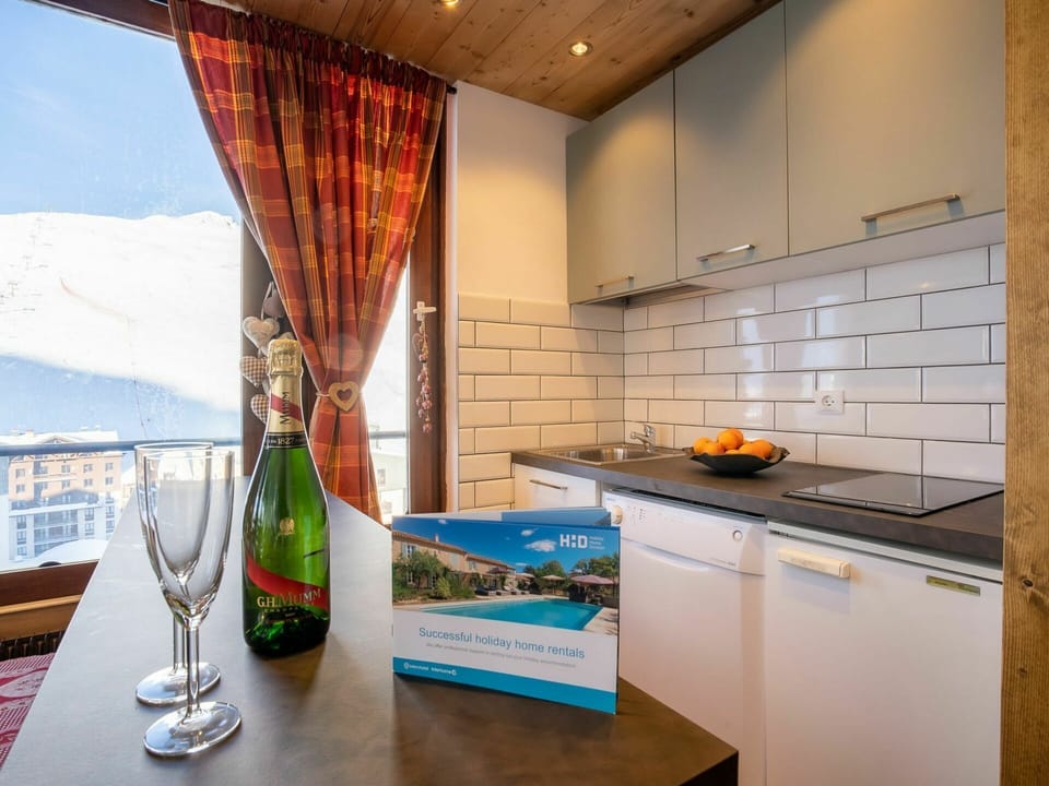 Property, Table, Furniture, Cabinetry, Bottle, Tableware, Drinkware, Building, Kitchen Appliance, Stemware