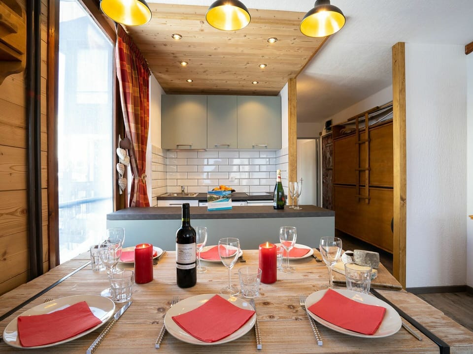 Table, Furniture, Tableware, Wood, Yellow, Kitchen, Cabinetry, Lighting, Interior Design, Bottle