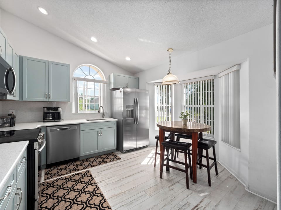 Gorgeous Kitchen with Basic Kitchen Starter Essentials and Breakfast Table