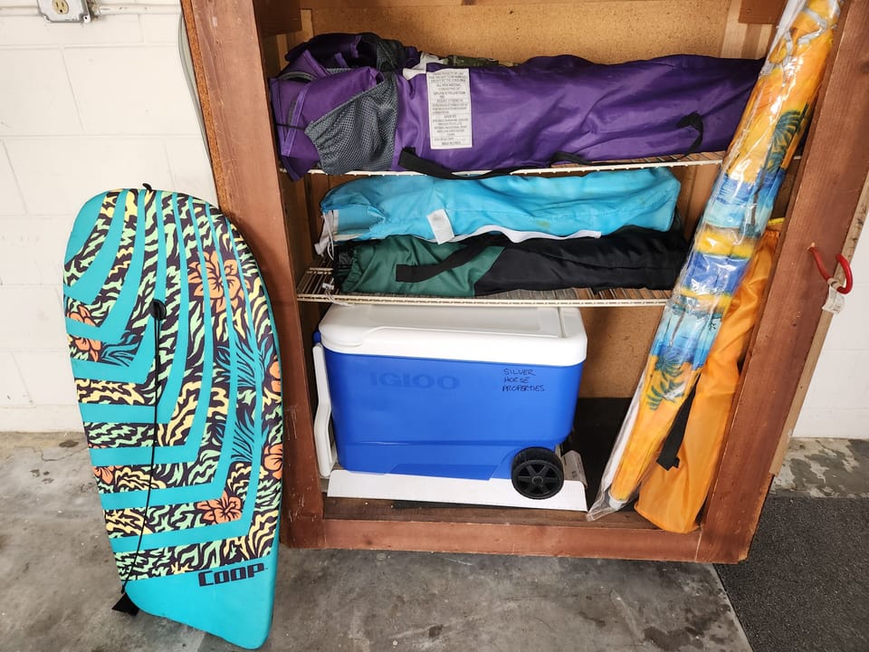 Beach chairs, cooler, umbrella, boogie board for the beach