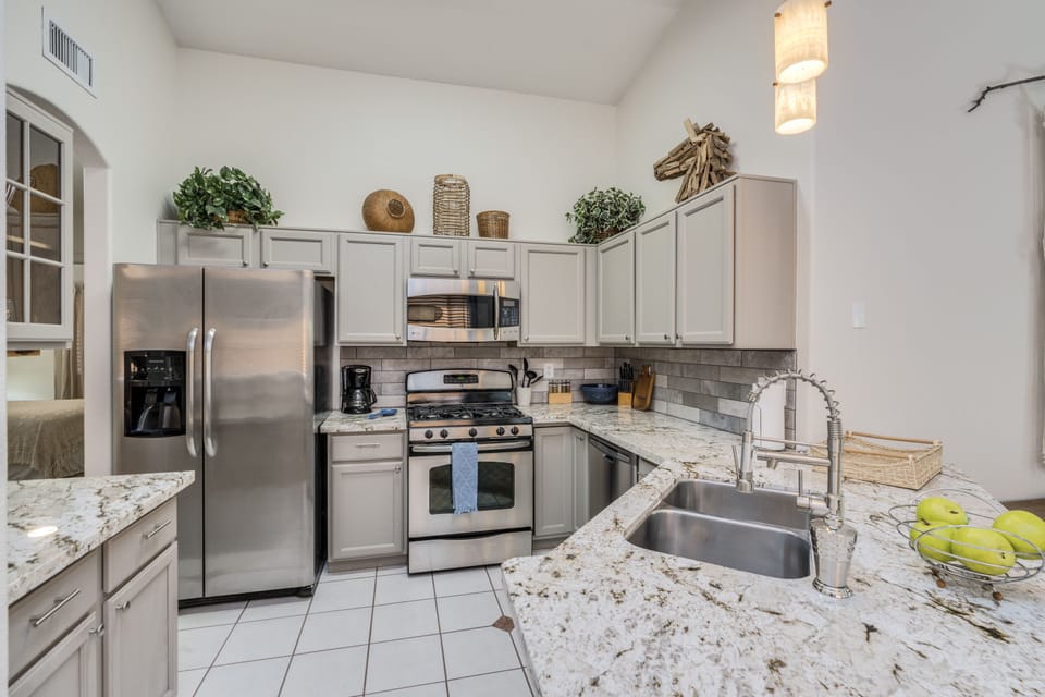 Stainless steel appliances in kitchen