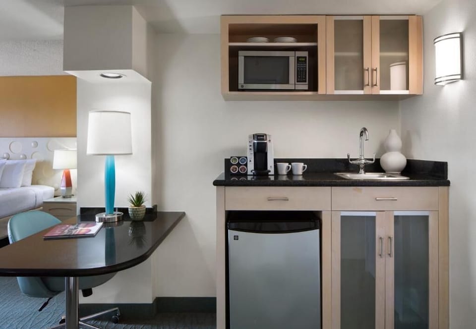 Whip up quick bites with microwave, sink, and mini-fridge.