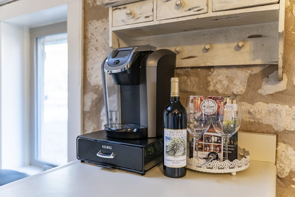 Keurig with coffee and creamer provided