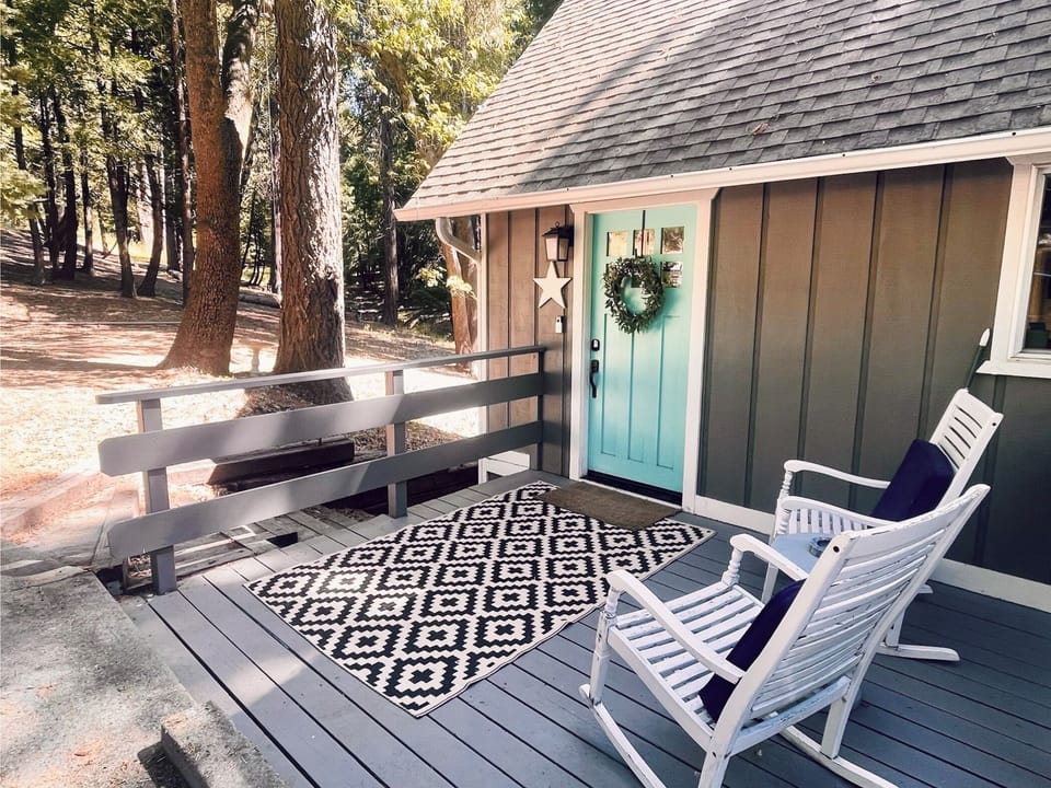 Front porch with rockers perfect for enjoying the sunset or sunrise.