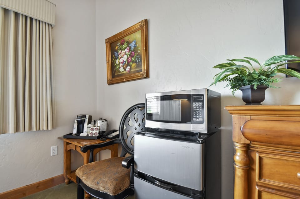 Guest bedroom's mini refrigerator and microwave