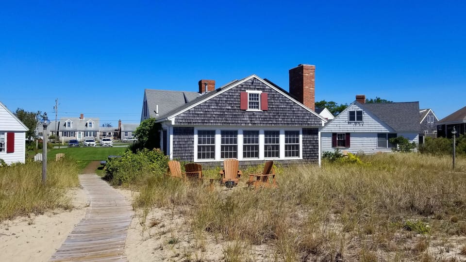 A path from the cottage leads to Cape Cod Bay