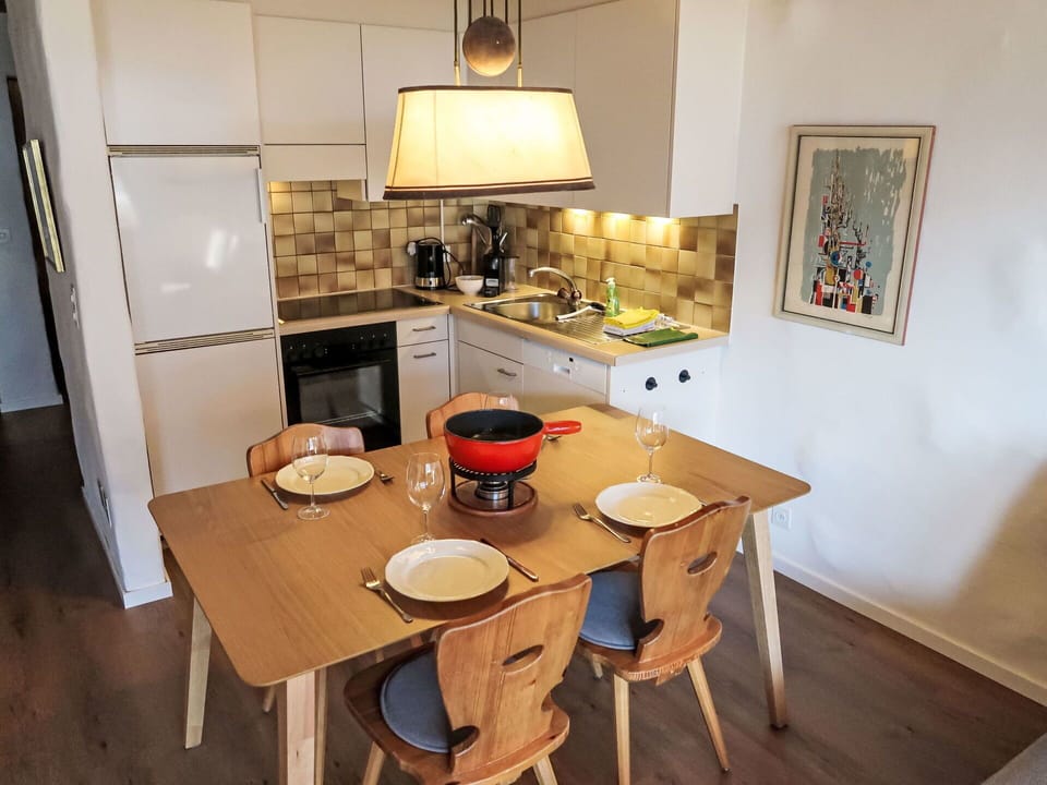 Furniture, Interior Design, Flooring, Kitchen, Wood, Floor, Chair, Kitchen Appliance, Countertop, Kitchen & Dining Room Table