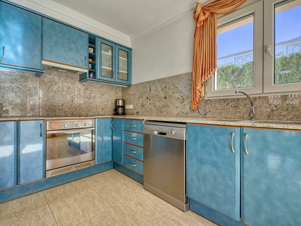 Cabinetry, Countertop, Furniture, Property, Tap, Building, Window, Azure, Kitchen, Kitchen Stove