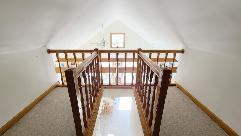 Second floor open loft with two twins