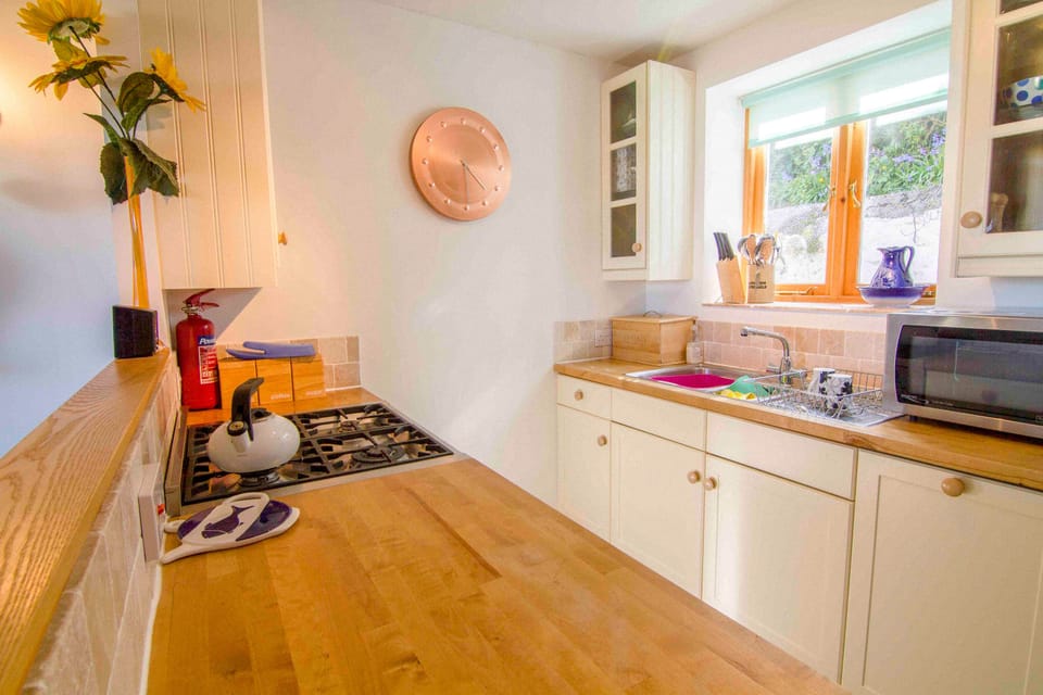 Galley kitchen with Smeg and Neff appliances