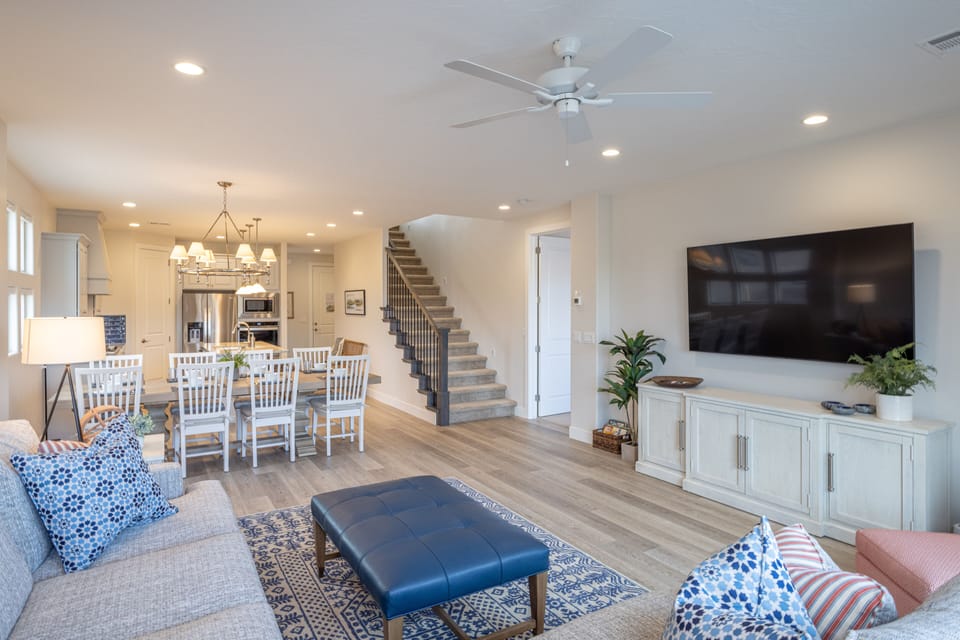 Living Room Seating View - The Living Room is located adjacent to the dining room and is the perfect place to relax and watch your favorite movie or TV program.