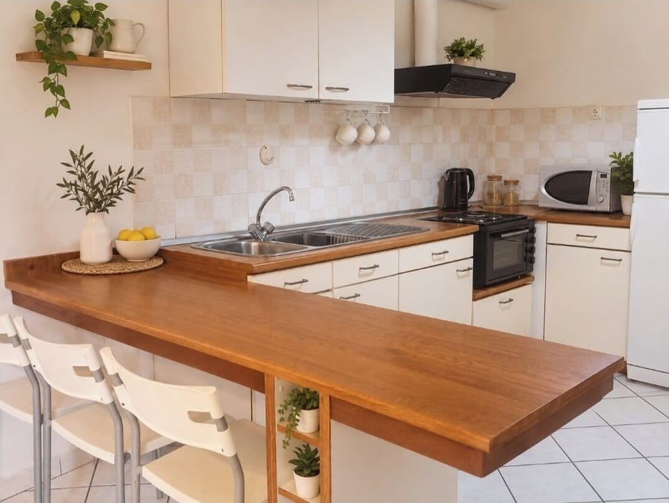 microwave, kitchen visible, indoor,  coffee maker, kitchen, oven, refrigerator, stovetop