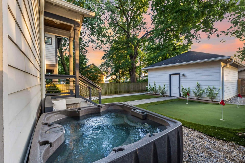 The hot tub comfortably accommodates up to 6 guests, perfect for unwinding.