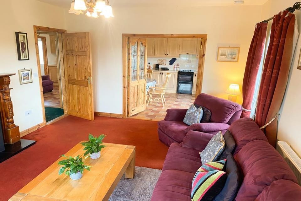 Cosy sitting room with open fire.