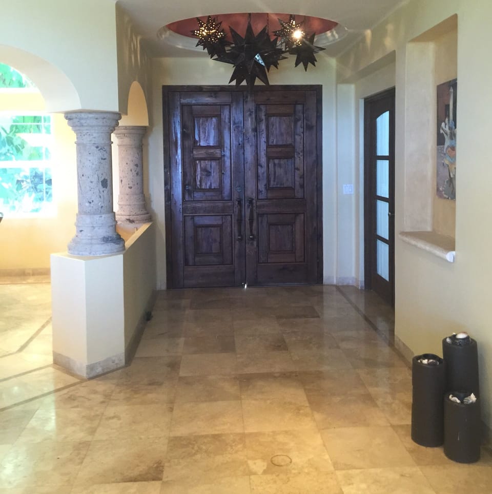 Front door entry foyer 
Den to the right dining room to the left 