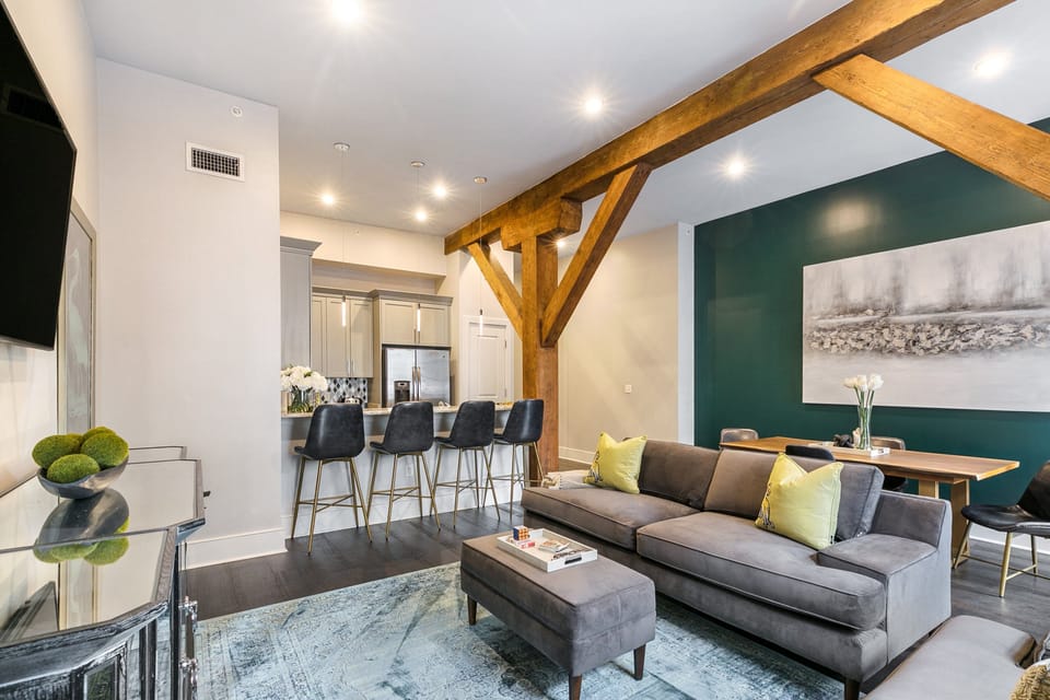 Open concept living, kitchen, dining area with lots of comfortable seating for you and your guests. 65” Samsung Smart 4K TV for streaming from apps, along with the DIRECTV Entertainment. Dining table with seating for four. All the natural light too!