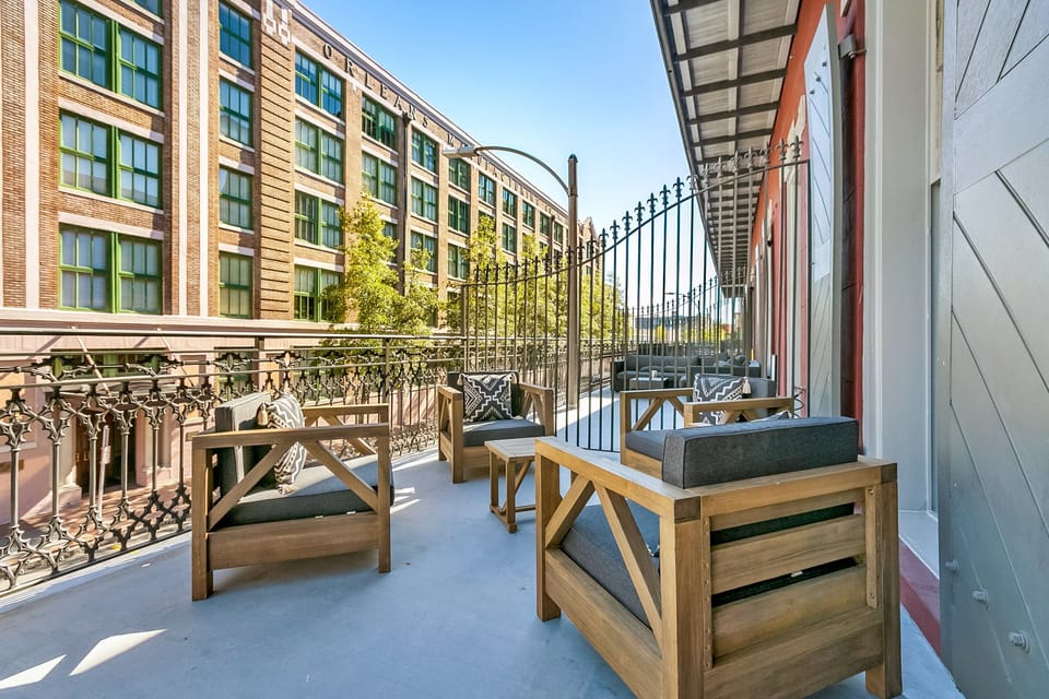 Extra deep balcony with cozy sectional and coffee table. Perfect for morning and evening relaxing!