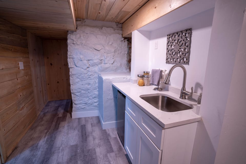 Kitchenette in basement. 