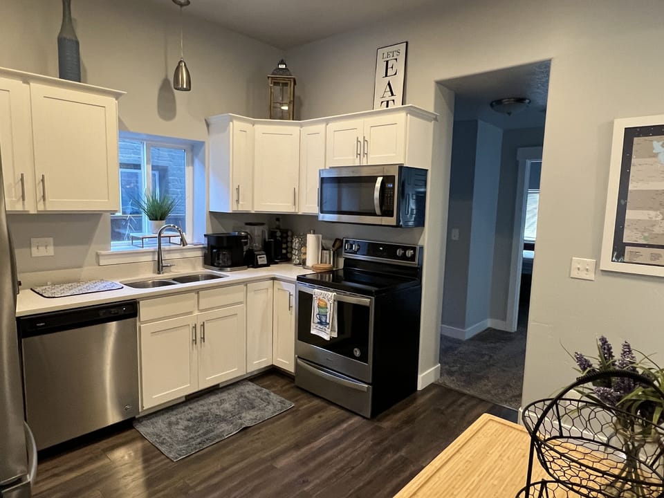 Kitchen with stainless steel appliances and granite counter tops.