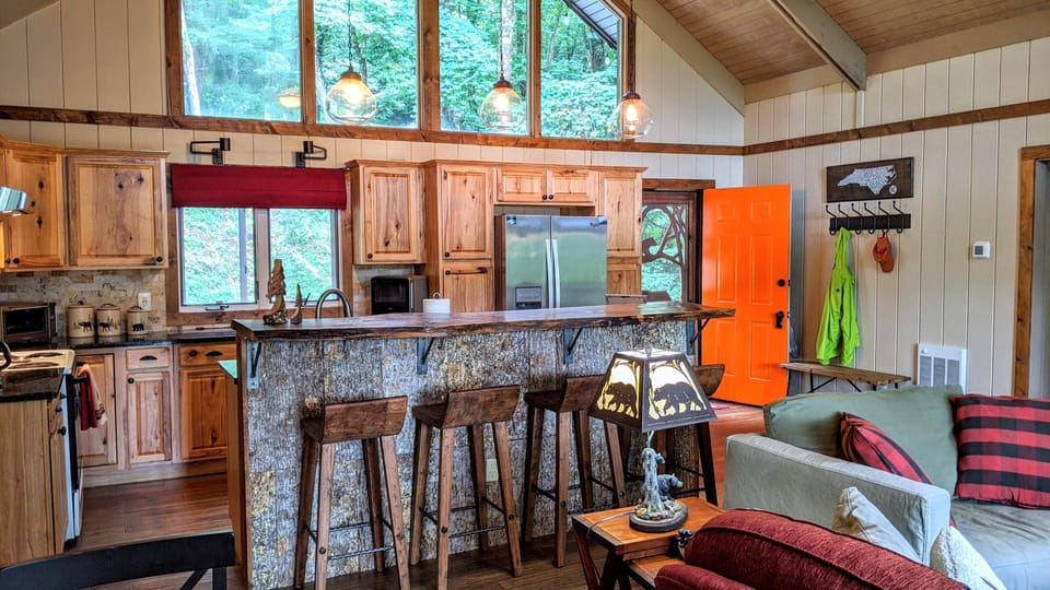 Enjoy casual seating on our live edge black walnut bar on the kitchen island.