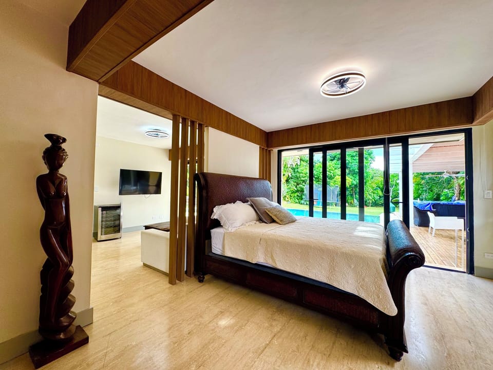 The main Bedroom is designed as a luxury hotel BD, wake up with a pool vies