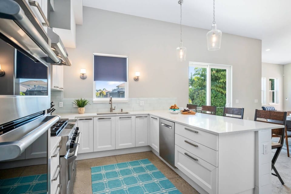 Meal prep is a breeze with ample counter space, a six-burner stove, and multiple ovens.
