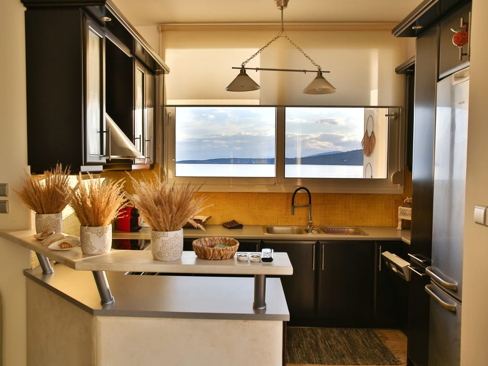 Modern kitchen with large window 
