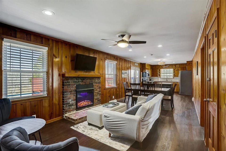 Welcome to the rear living area which is open to the dining area & kitchen.