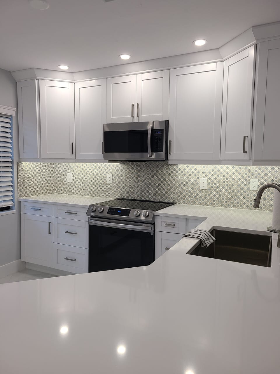 granite counters, all new appliances and cabinets, beautiful new floors