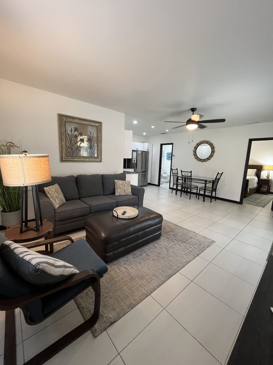 Bright open living and dining area—perfect for relaxing after beach days