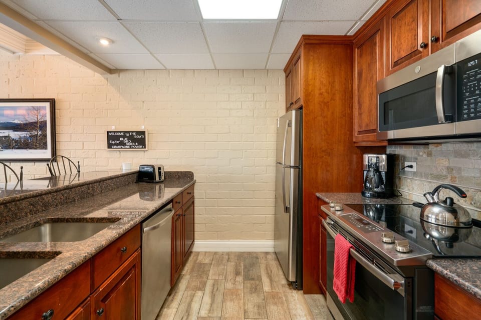 Stainless appliances in our efficient kitchen.