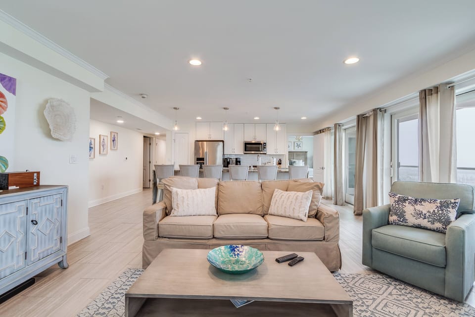 Professionally decorated.  Living Area looks out over bay.  Gas fireplace & TV.