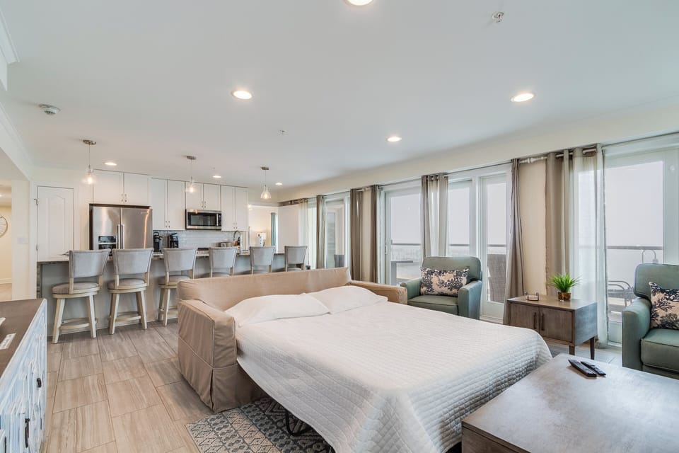 Living area includes a sleeper sofa for extra guests