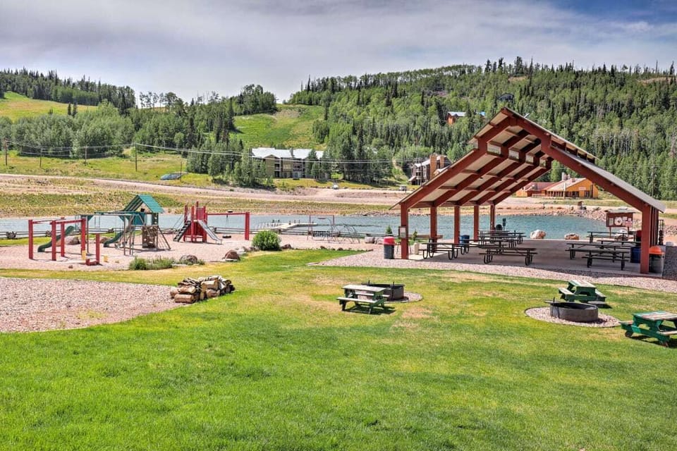 The Condo's picnic and play area for cookouts with a playground for the kids