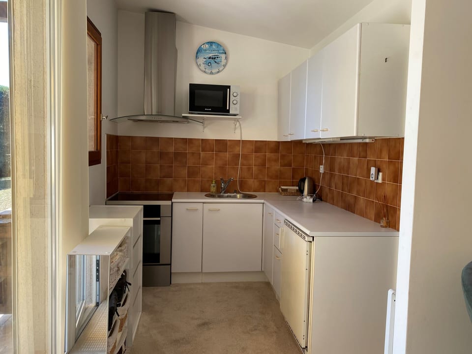 Well-appointed kitchenette with stove/owen/microwave and all kitchen equipment