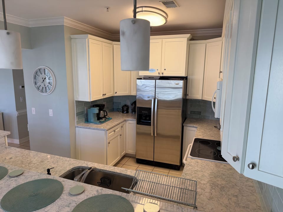 Fully equipped kitchen with Keurig, coffee, machine, /ble B/, and slow cooker