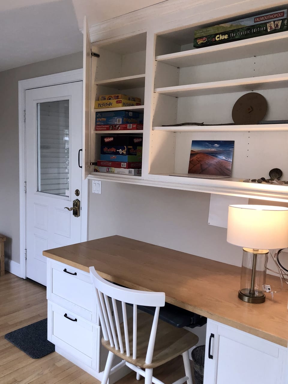 Work station off the kitchen (photo includes a peek at the game cabinet)