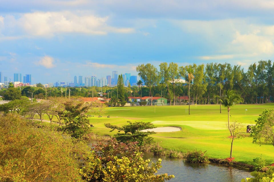 Gaze across manicured fairways with skyline views beyond.