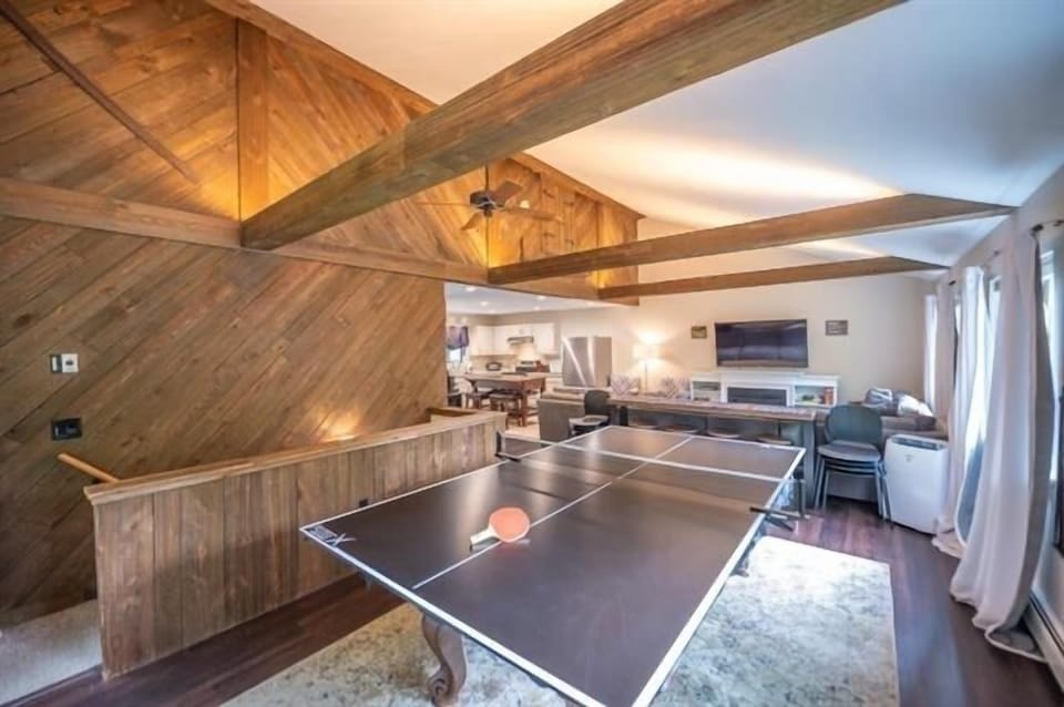 Ping pong table and game area — fun for kids and adults alike.