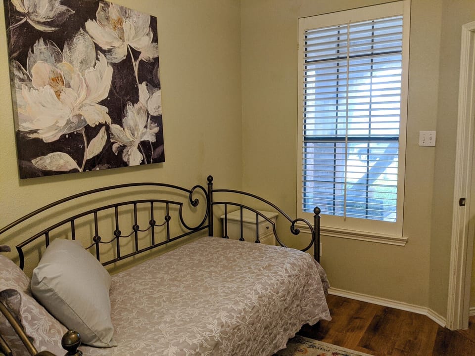 Second bedroom with window to front porch 