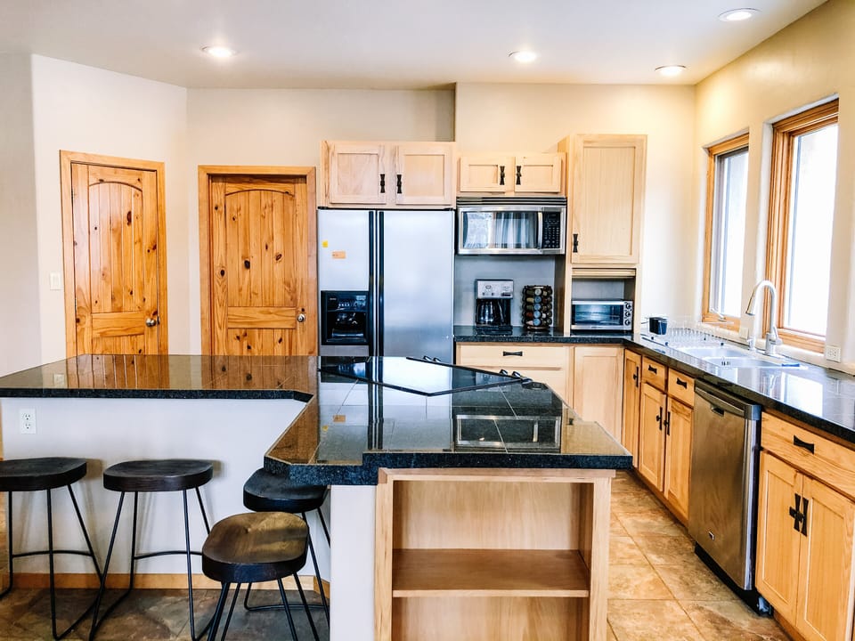 Fully stocked kitchen w/ coffee pot, nutribullet, waffle iron, panini press