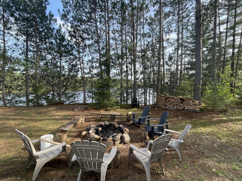 Lakeside firepit with plenty of seating for those campfire nights with S'mores