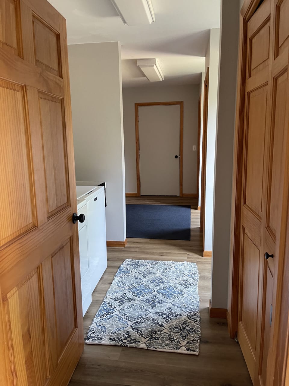 Large laundry room that connects to the garage.