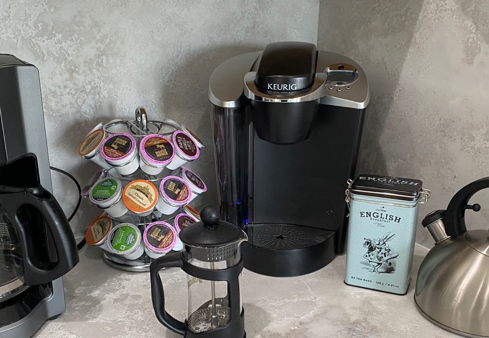 2 coffee bars; 1 in the kitchen and 1 in the primary suite upstairs.