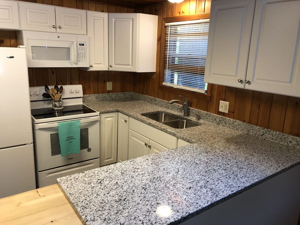 Newly renovated kitchen with granite counters